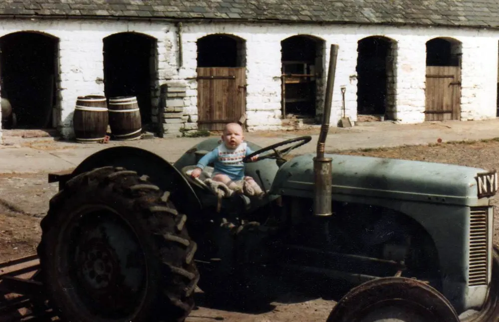 Tractor at Great House Farm (family photograph, date not recorded; Wayback Vault)